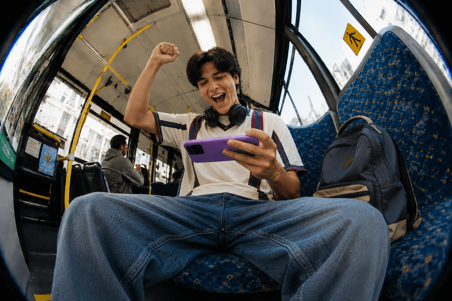 Person watching football on mobile device